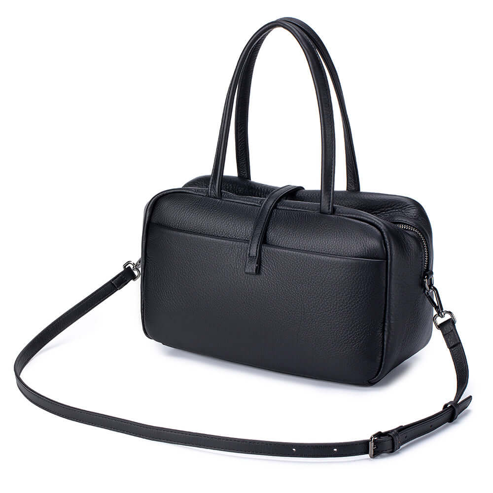 Structured leather handbag with soft rounded shape
