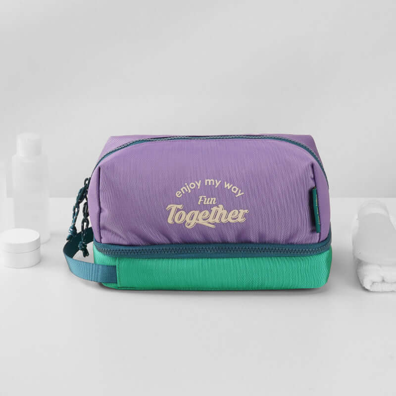 Travel toiletry bag showing towels and toothbrush storage.