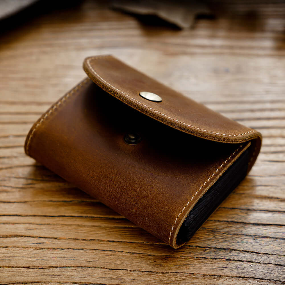 Brown genuine leather mini wallet with snap closure