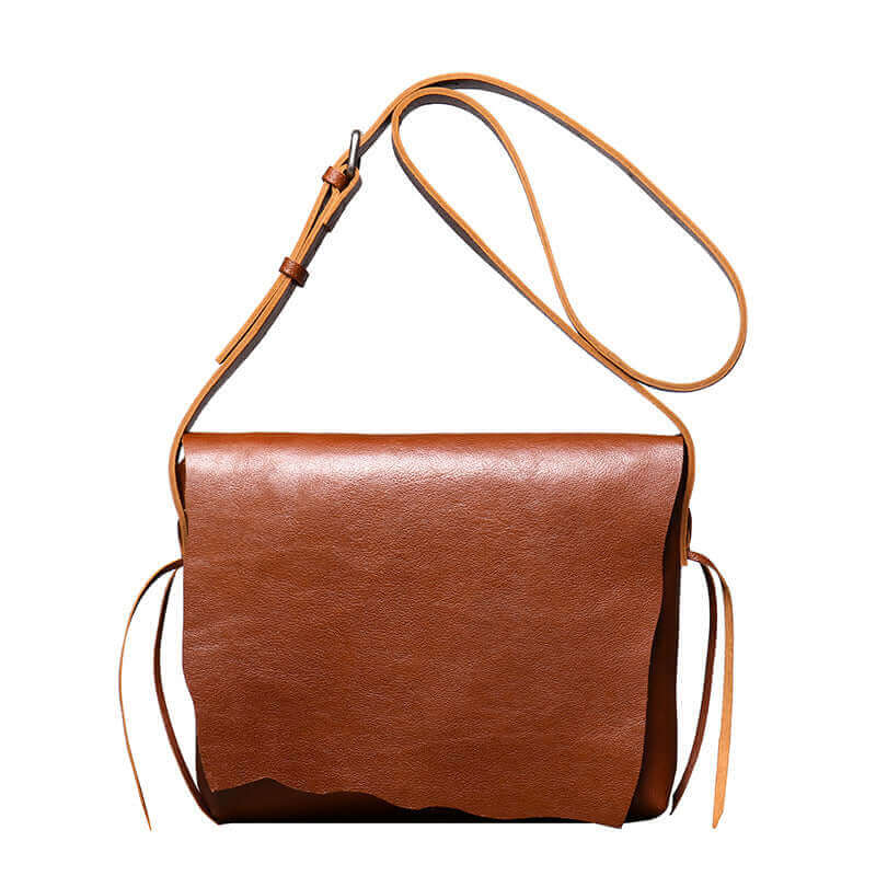 Vintage brown leather crossbody messenger bag for men and women.