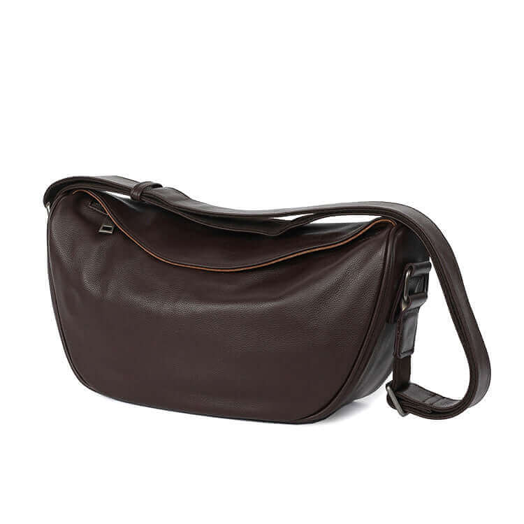 Front view of vintage leather shoulder crossbody bag made from genuine cowhide.