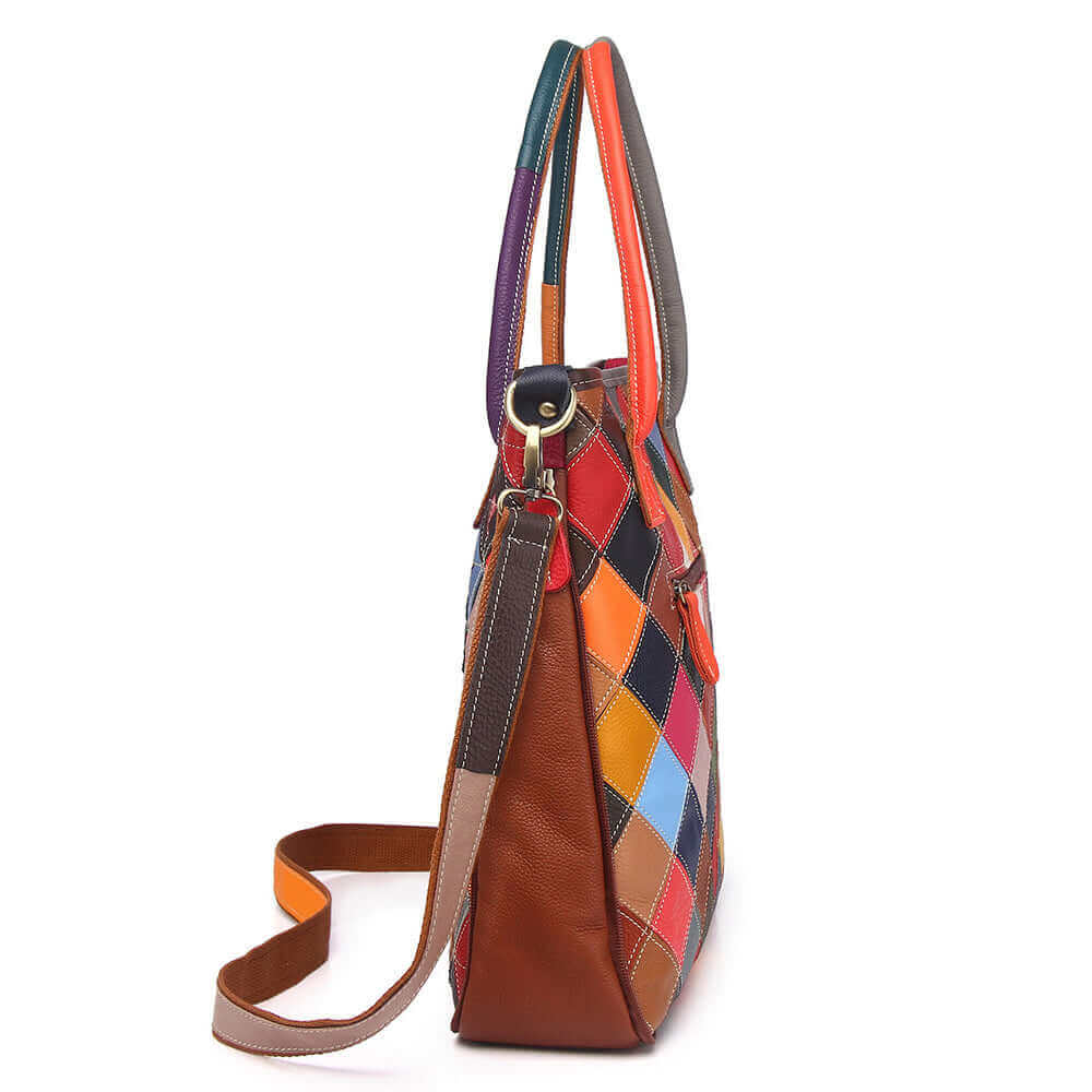 Side view showing the colourful patchwork and expandable zipper design.