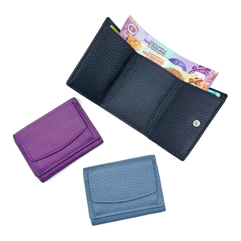 Leather RFID mini wallet, offering compact storage for cards, cash, and coins.