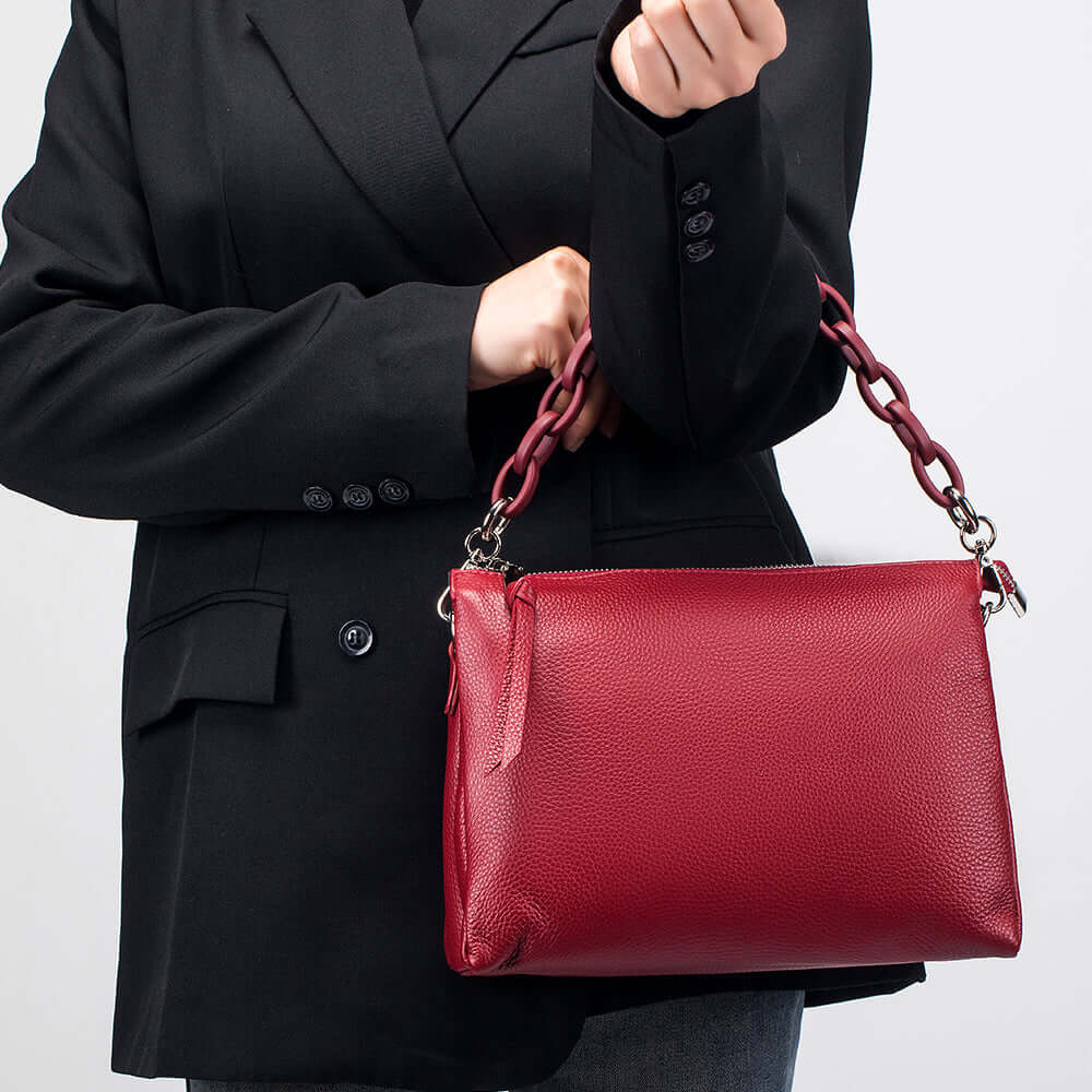 Elegant design of the Women's Leather Crossbody Bag with chain handle.