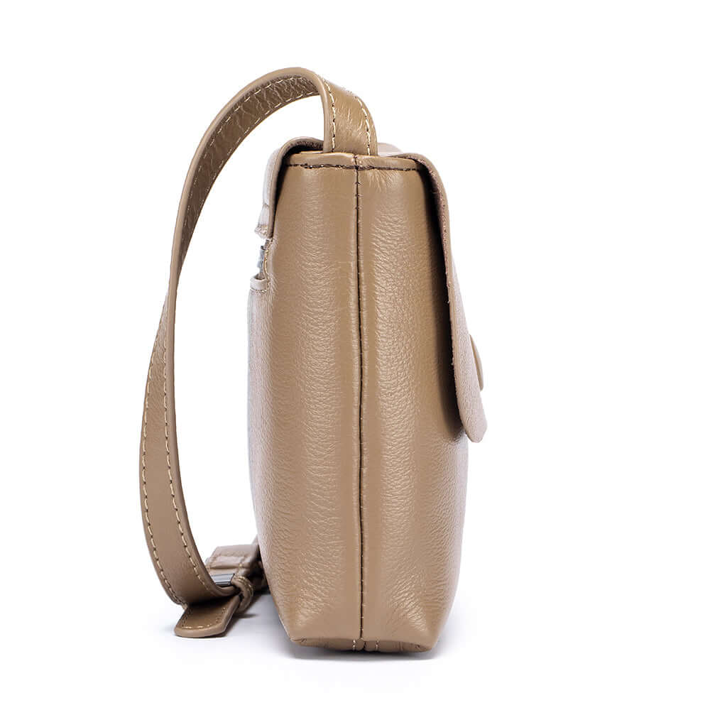 Side view of a women's small genuine leather crossbody bag in khaki.