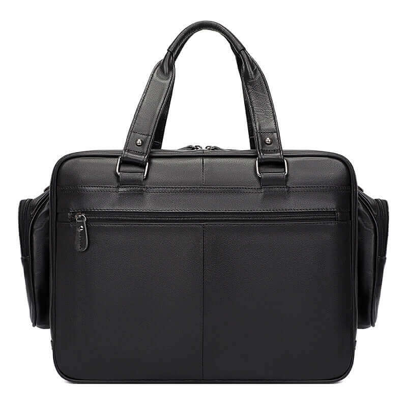 Men's leather laptop bag being carried as a handheld briefcase