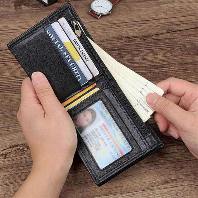 Open view of a black leather RFID wallet showing card slots and compartments.