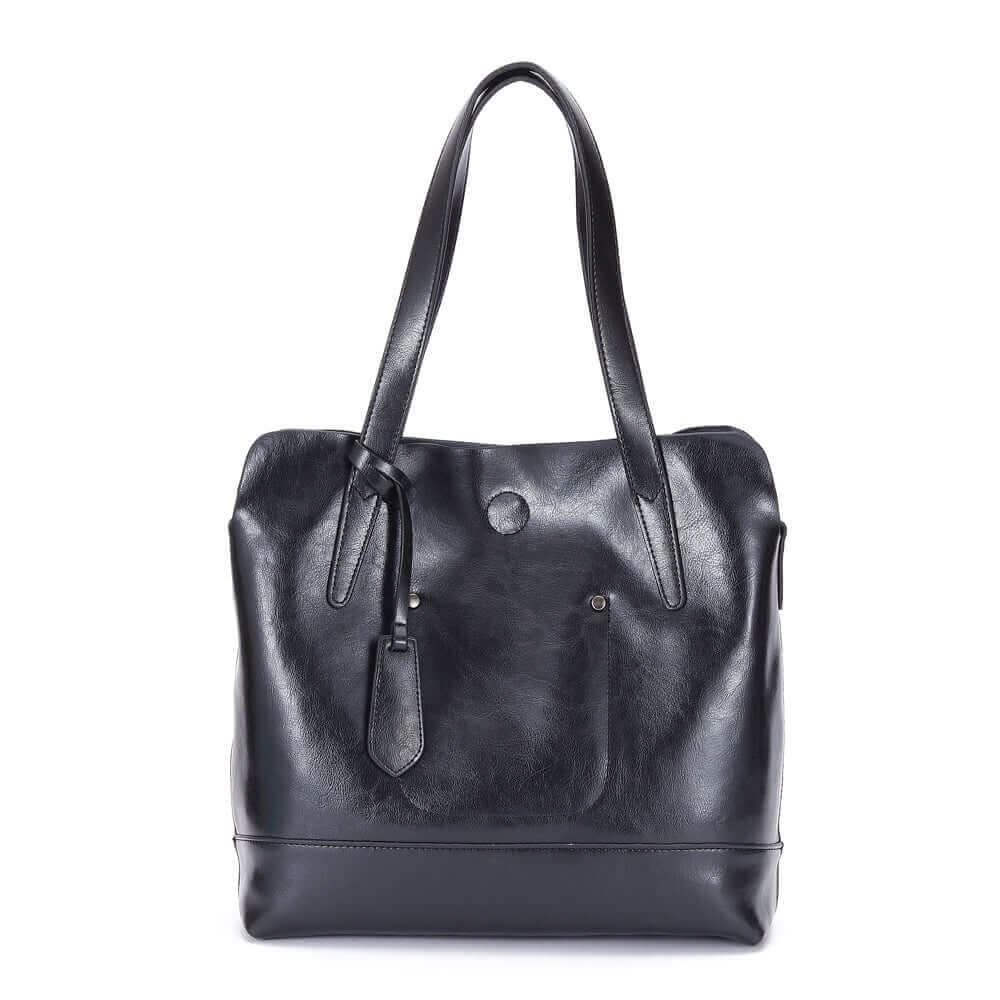 Versatile tote handbag with magnetic closure and multiple compartments.