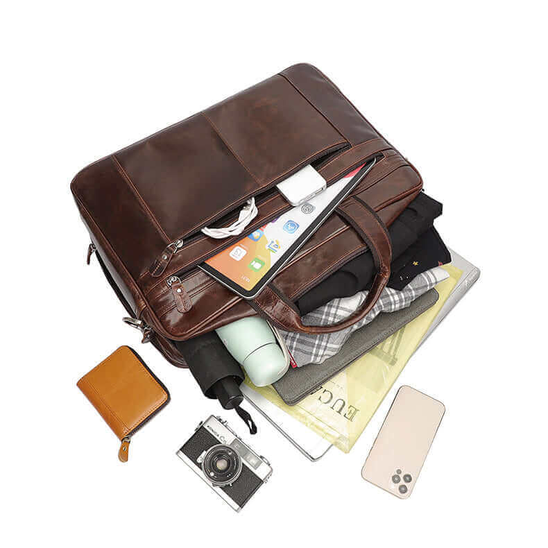 Organized compartments inside the leather laptop bag.