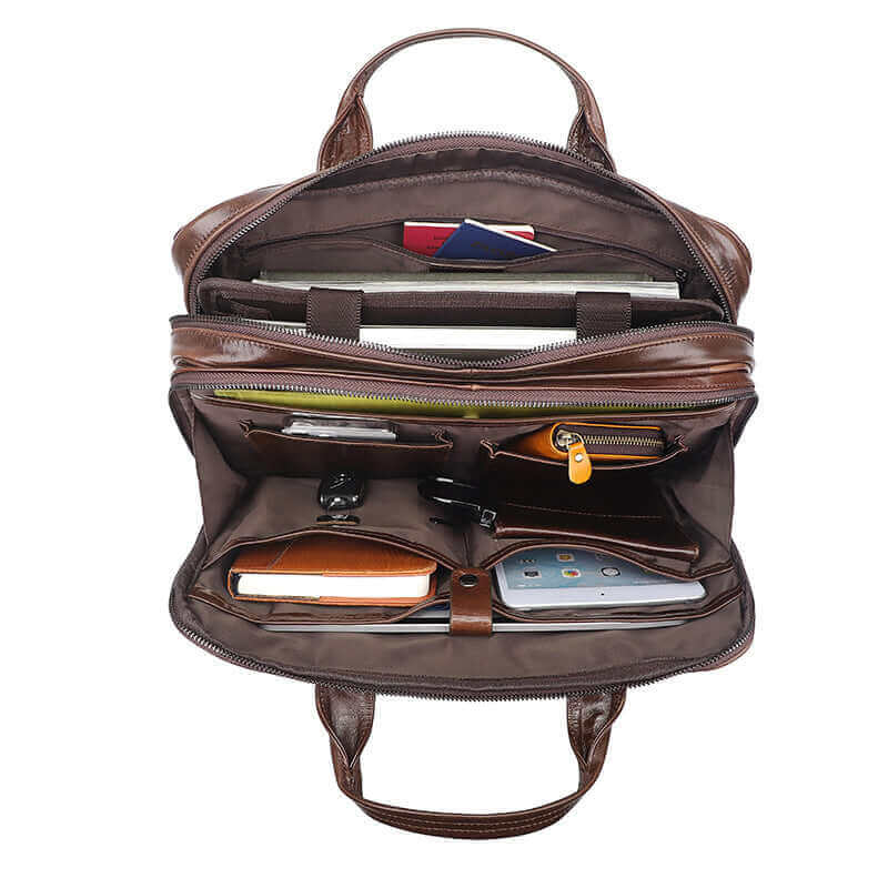 15.6-inch laptop inside the leather bag's main compartment.