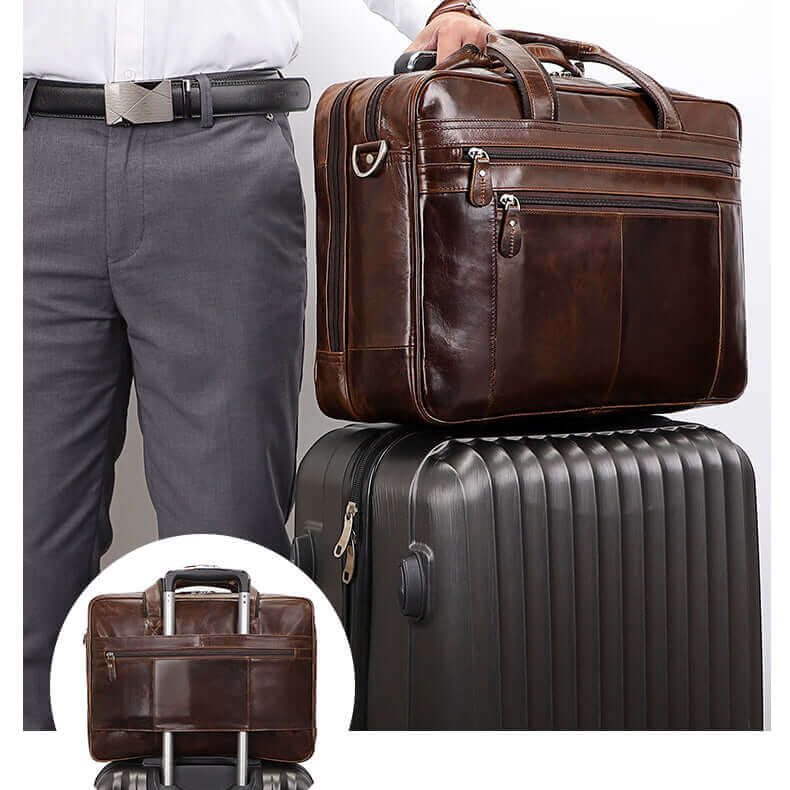 Leather laptop bag with trolley strap for convenient travel.