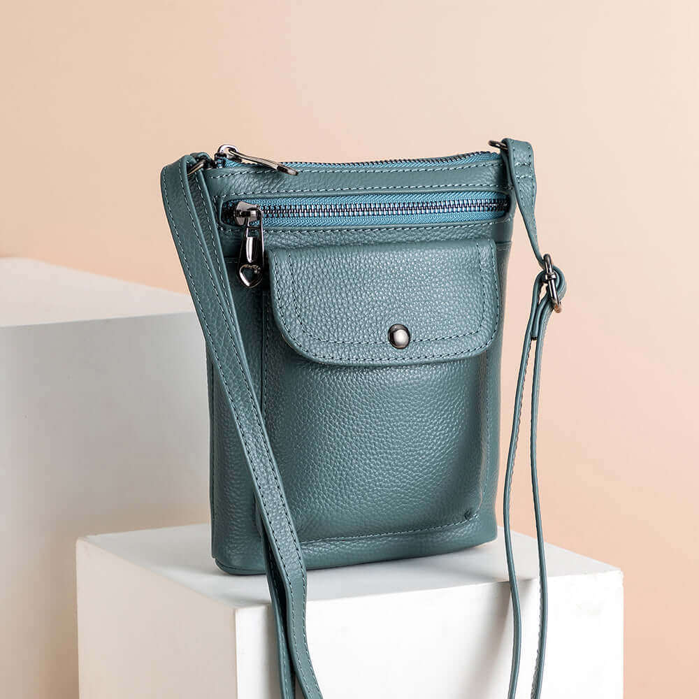 Leather crossbody bag for women, featuring convenient pockets for organized storage.