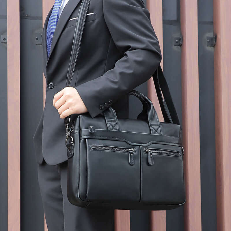 Black leather laptop bag ideal for daily corporate routines.