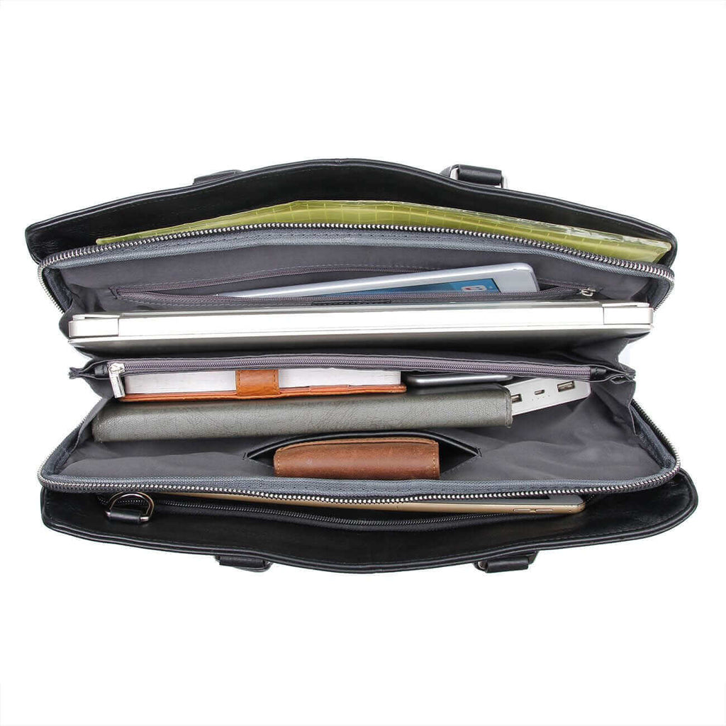 Interior view of the black leather laptop bag with organized compartments.