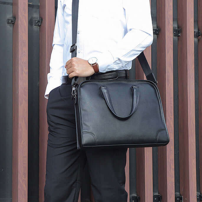 Sleek black leather laptop bag for professional men.