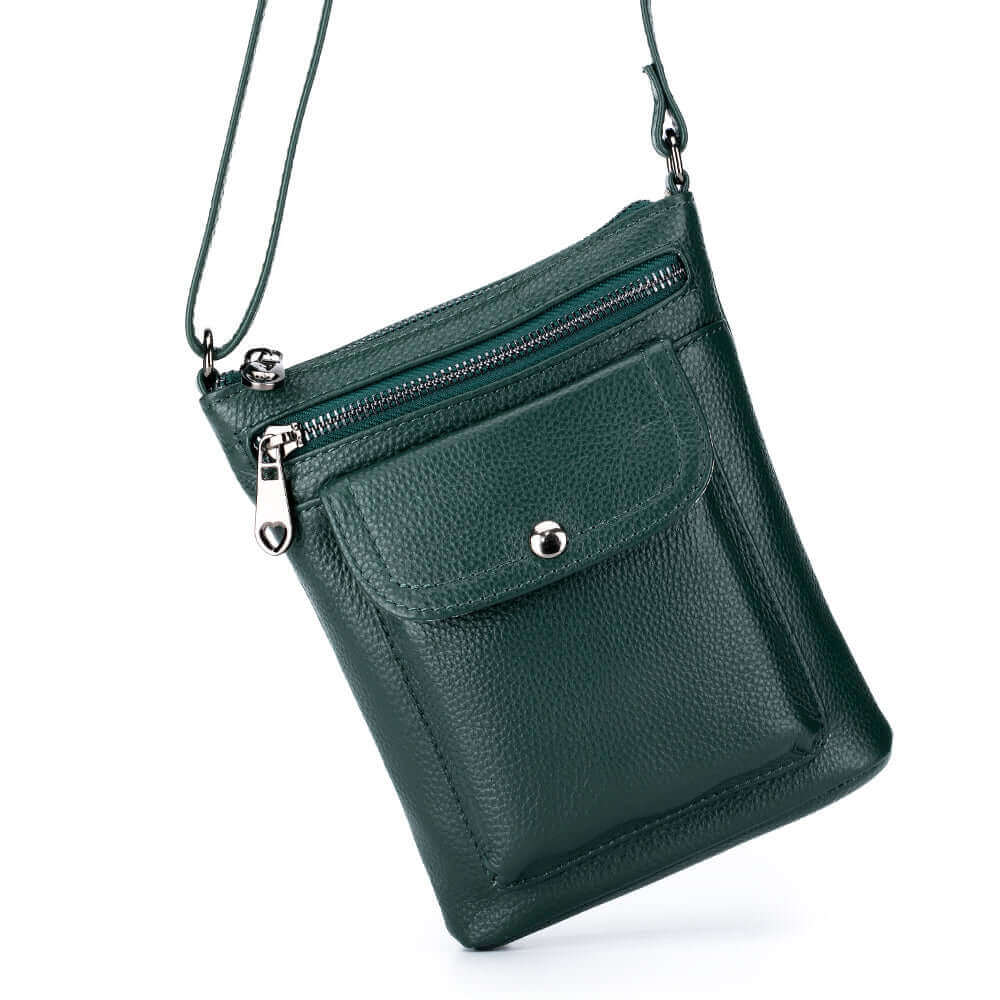 Practical women's leather crossbody bag with zipper pocket and front pocket.