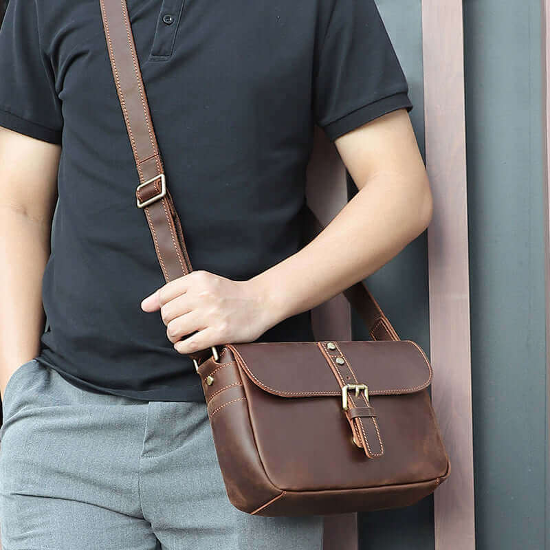 Retro leather shoulder bag with adjustable strap and magnetic flap closure.