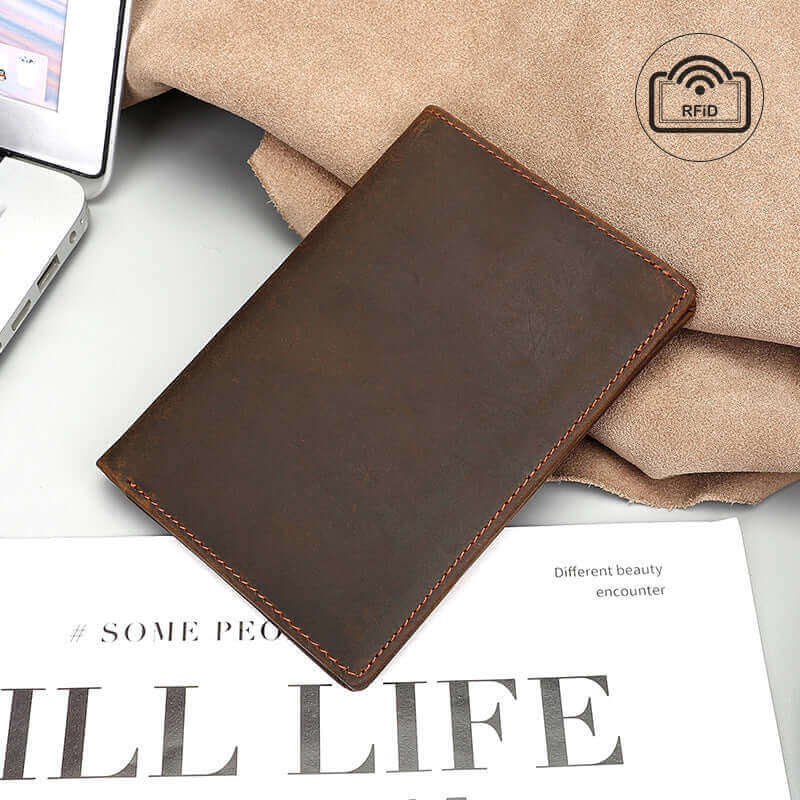 Brown RFID-protected leather passport holder for travel