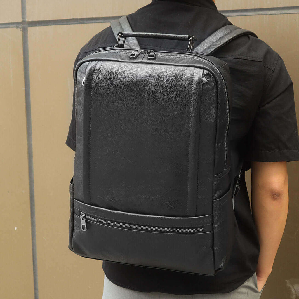 Spacious leather laptop backpack fitting 17-inch devices in NZ.

