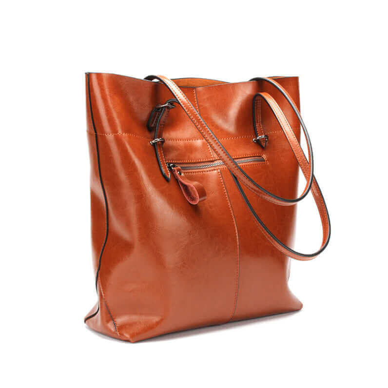 Spacious interior compartments of the leather tote bag.