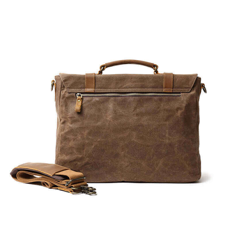 Back view of the vintage leather and canvas laptop shoulder bag, highlighting its reinforced stitching.