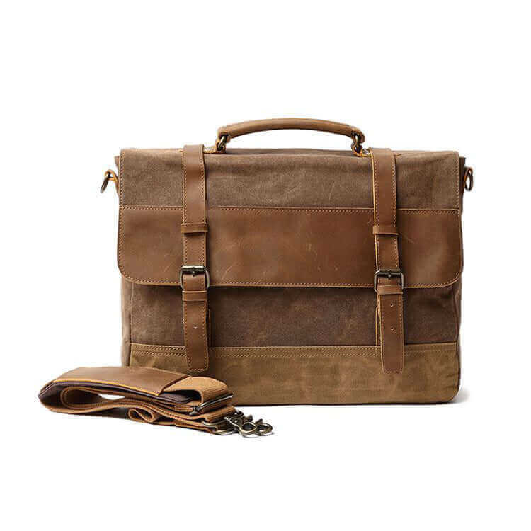 Front view of a vintage leather and canvas laptop messenger bag, showcasing its classic design.