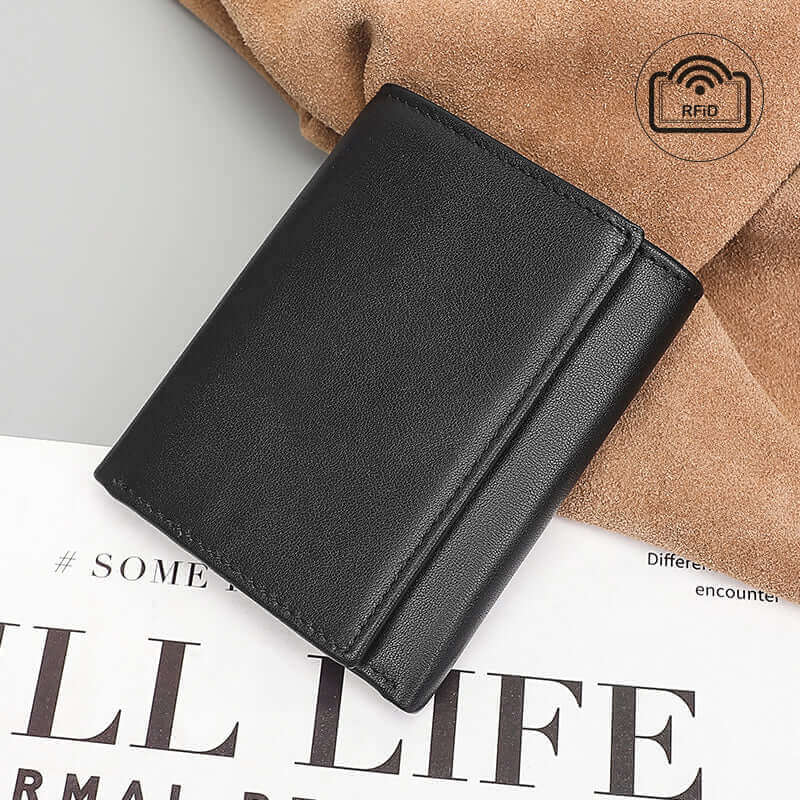 Men’s RFID tri-fold wallet with spacious card slots and sleek design.