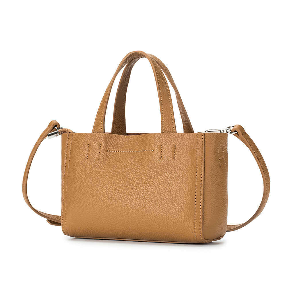 Women's genuine leather mini handbag in brown with adjustable shoulder strap.